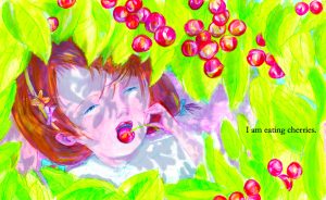 Child eating a cherry in shade under green leaves and red cherries of tree.