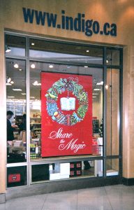 Wreath illustration on red background.