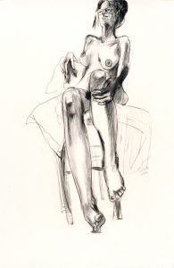 Low horizon view to slightly distort frontal view of bespectacled female figure, reclining on fabric-draped chair. right elbow slung over chair back, left hand holds elevated knee.